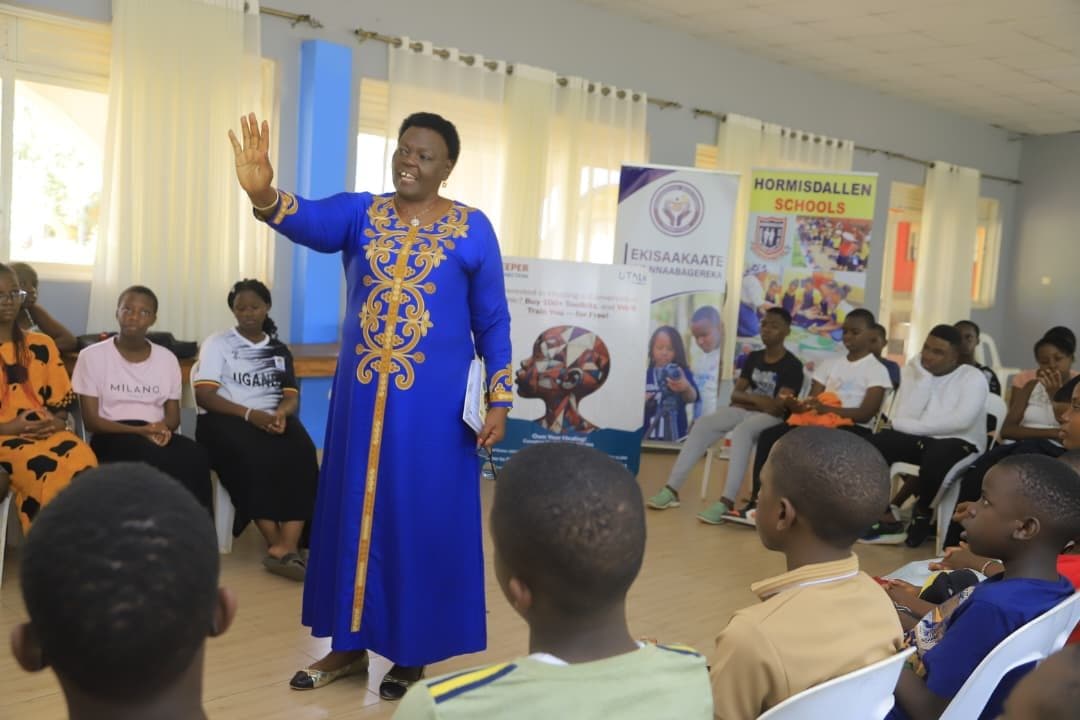 A Community Champion training a room of young people